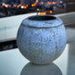 Wheel-Thrown Pottery Art Piece- Channel Cut Orb, Multiple Shades of Blue, with Copper Color and Speckles, Dimensions:  6h"x 6w"
